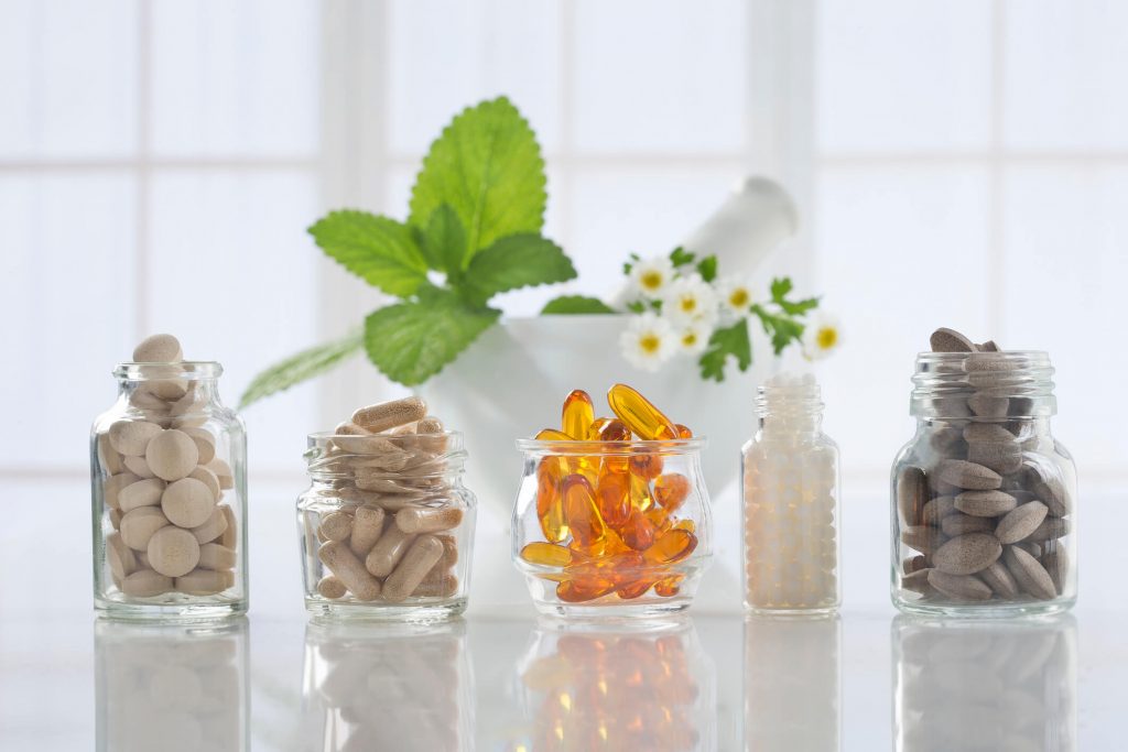 Supplement pills in jars