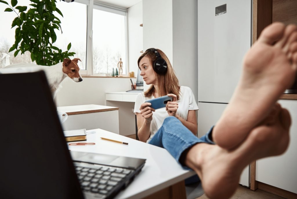 distracted woman working from home